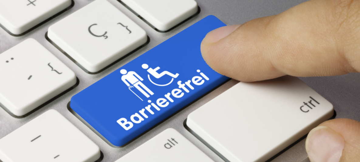 Finger klickt auf Tastatur-Button "Barrierefrei" Ein Finger klickt auf einen Tastatur-Button mit dem Schriftzug "Barrierefrei"