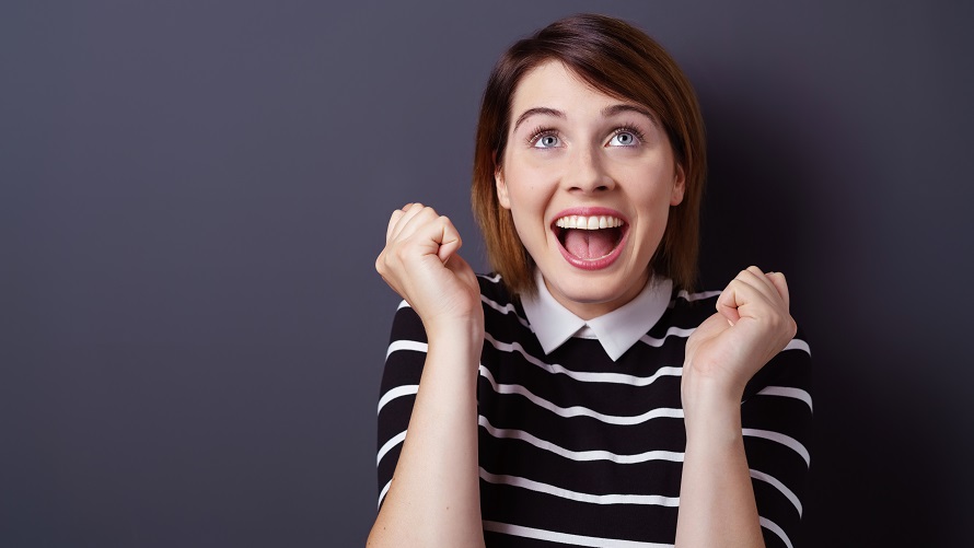Woman expresses her excitement facially Woman expresses her excitement facially
